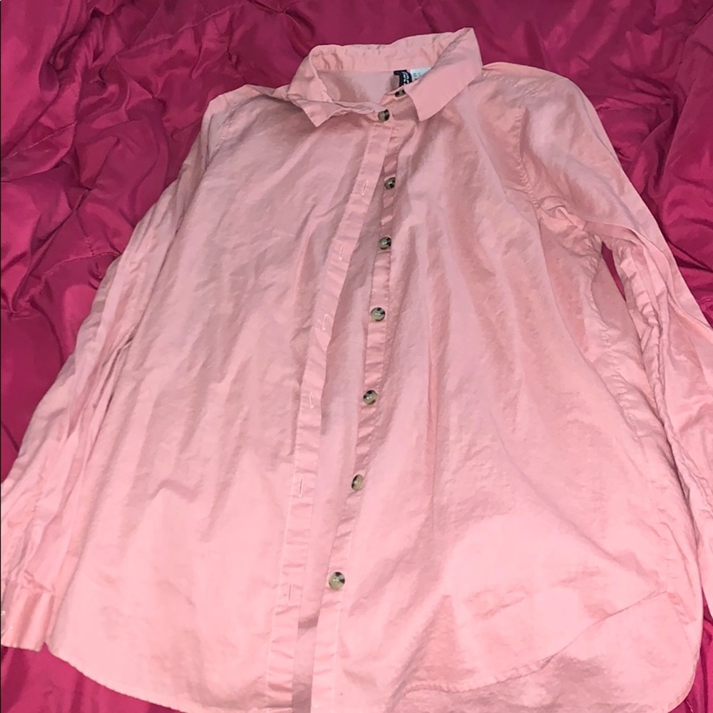 Divided peach button-up shirt